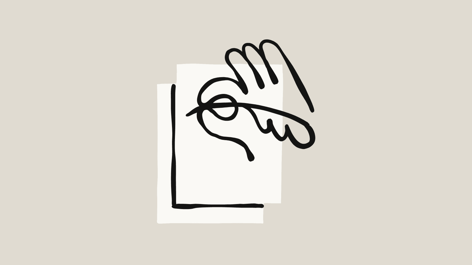 A hand holding a pen over a sheet of paper